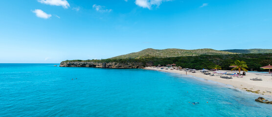 Fototapeta premium Stunning day at Grote Knip Beach in Curacao reveals crystal clear waters and serene landscapes