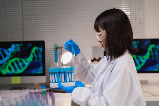Female scientist working with dna samples in a laboratory