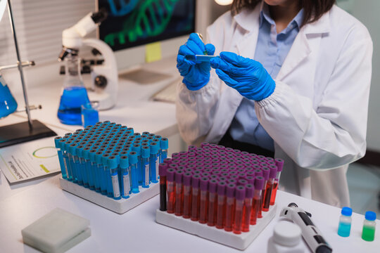 Scientist analyzing medical samples for genetic research