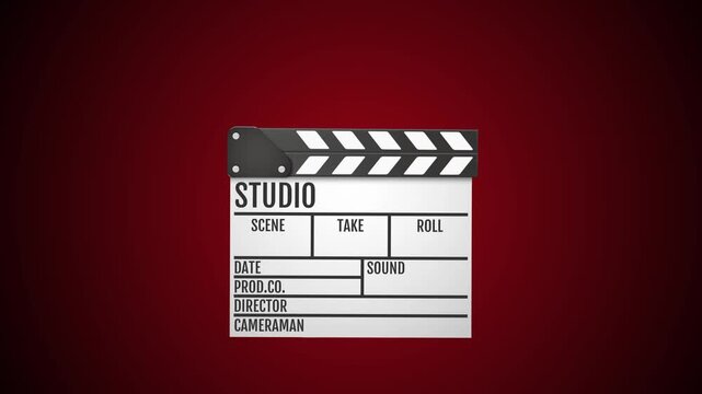 Movie clapper board opening and closing for studio production footage. professional film making equipment