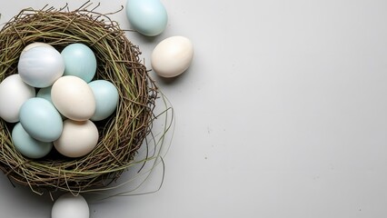 Easter eggs in a bird's nest on white background for springtime and holiday celebrations