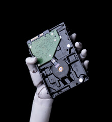 AI Robotic Hand Holding Hard Drive for Data Storage and Hardware Analysis