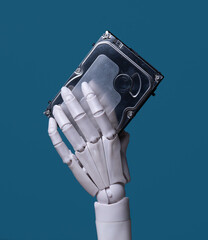AI Robotic Hand Holding Hard Drive for Data Storage and Hardware Analysis