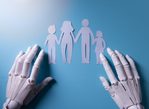 AI Robotic Hands Protecting Paper Cutout Family for Safety Concept