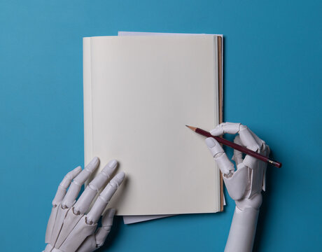 Futuristic Creative Planning Concept with AI Robot Hand and Empty Paper