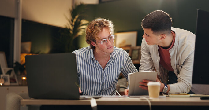 Night, creative and team in office with tablet, campaign review or discussion for digital marketing. Late, people and conversation with tech for planning, brainstorming or online advertising insight.