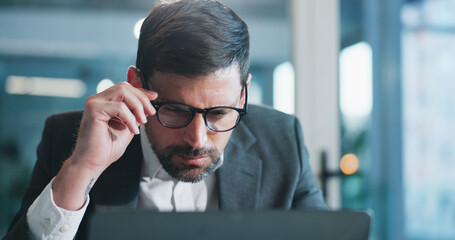 Reading, glasses and businessman in office with computer for research on coding project with IT....