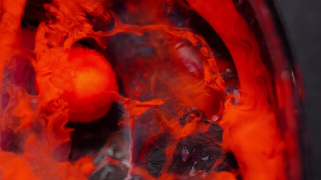 Vibrant ink swirling with dynamic flow in detailed macro shot