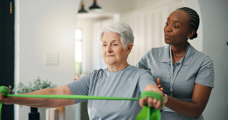 Obraz premium Physiotherapy, resistance band and help old woman in home, strength training or exercise. Senior person, physical therapy and assistance for muscle recovery, rehabilitation or fitness in retirement