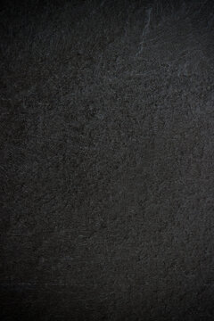 Dark grey black slate background or texture