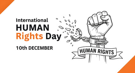 Obraz premium A victorious fist breaks free from chains for International Human Rights Day.