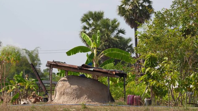 A charcoal production kiln in rural Thailand, taken at Sakon Nakhon.
