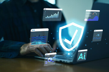 Businessman Using Computer with Advanced AI Cybersecurity Digital Shield Protecting Data, Network Systems, and Confidential Information from Cyber Attacks