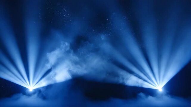 Intense blue light beams resembling powerful searchlights sweeping across a particulate, foggy abstract dark environment rays, atmospheric effect, illuminated particles