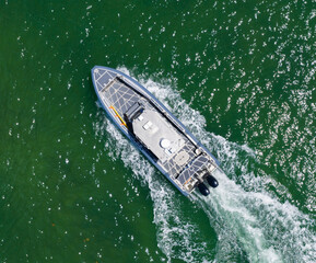 Yacht boat tour. Luxury boat yachting. Motorboat sailing at sea. Luxury private yacht in sea. Motor yacht luxury vessel. Boat motor aerial. Vacation on summer. Aerial view motorboat