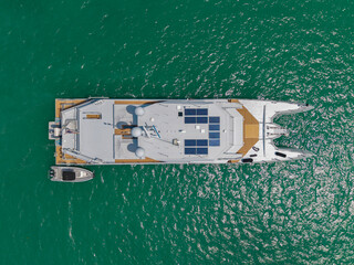 Yacht boat tour. Luxury boat yachting. Motorboat sailing at sea. Luxury charter yacht in sea. Motor yacht luxury vessel. Sea motor boat. Sea summer vacation. Aerial motorboat