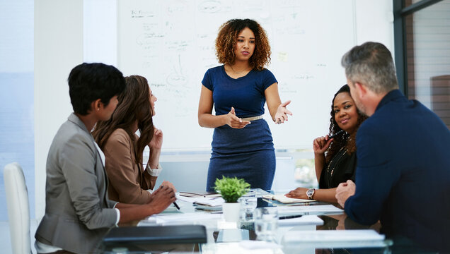 Business woman, team and presentation in office for funding pitch, investment and planning. Presenter, group and employee in meeting for finance project, explain and question with equity discussion