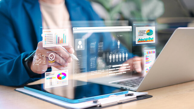 Business professional analyzing data and dashboards on digital devices. Data analytics, business intelligence, performance metrics, management system, and corporate technology concept.