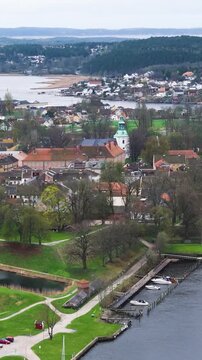 old town encircled by ramparts moats along glomma river red roofs promenades harbor views define fredrikstad norway wide aerial drone view fortified 