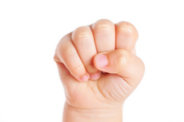 Hypermobile joint Close up of a baby's clenched fist against a white background hand