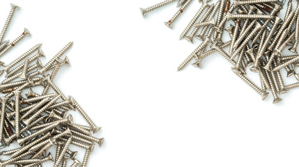 Top view of group of silver stainless steel wood screws isolated on white background.