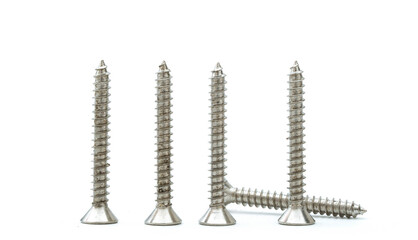 side view of group of silver stainless steel wood screws isolated on white background.