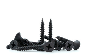 side view of group of Drywall  screws isolated on white background.