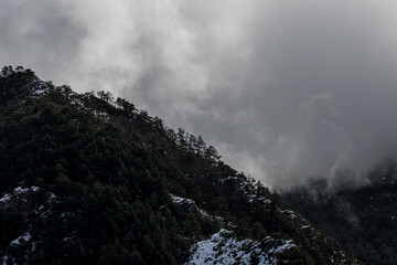 Snow-covered mountains and cloudy sky in the Pyrenees