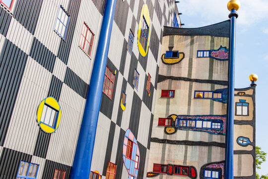 The spittelau waste incineration factory hundertwassers iconic creation in vienna, blending art, sustainability, and functionality.