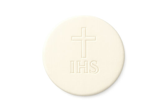 Communion wafer with cross and ihs symbol on neutral background