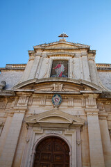 Obraz premium Entrance portal of the Collegiate Church of St. Paul is an important Baroque church in Rabat on the island of Malta