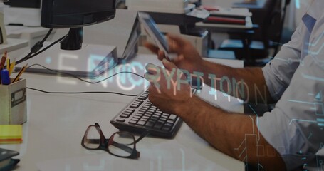 Holding phone, office worker wearing rolled sleeves and watch scrolling at desk, with glasses