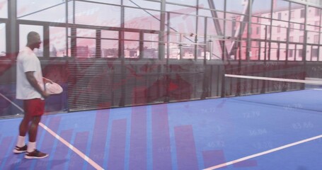 Fototapeta premium Standing man holding paddle at line on blue court with net, glass, charts, red-shorts, copy space