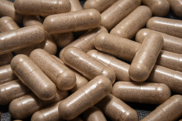 Herbal Supplement Capsules Close Up, Natural Medicine and Dietary Supplement Concept