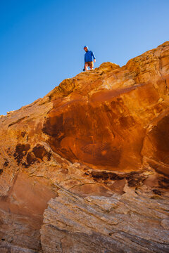 Man Discovering Ancient Petroglyphs in Bears Ears