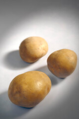 Fototapeta premium potatoes on white background