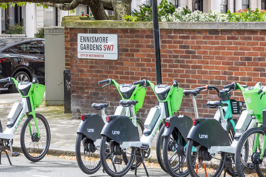 Green Electric Rental Bikes Parked on Ennismore Gardens. London, UK, 7 April 2024