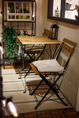 cozy home interior with potted plants, shelf decor and warm lighting