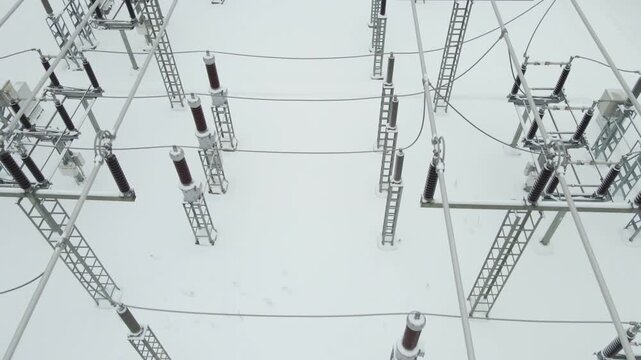 Snow Covered High Voltage Substation Components in Winter
