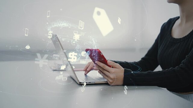 スマホとノートパソコンを使う女性とeコマースのコンセプト