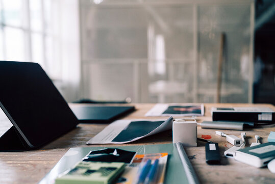 Office supplies with tablet PC kept on desk