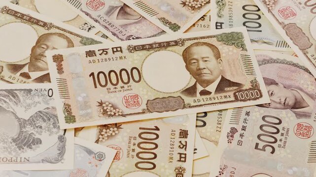 Place Japanese banknotes.日本紙幣を置く。