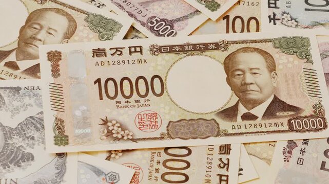 Japanese banknotes. Slide motion. 日本紙幣。スライドしていく映像（横に移動する）	
