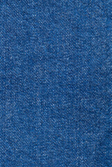 Naklejka premium Blue background, denim fabric close-up