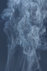 column of smoke on a gray background