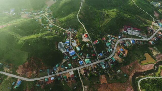 High-Altitude Arabica Coffee Farm Aerial: Lac Duong, Lam Dong Province
the unique topography of the Central Highlands, where coffee is grown on steep slopes to ensure drainage and quality. 
