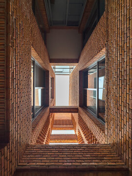 Dramatic Worm's Eye View of Architectural Detail of Textured Brickwork in Modern Urban Design 