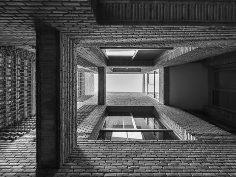 Dramatic Worm's Eye View of Architectural Detail of Textured Brickwork in Modern Urban Design 