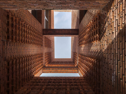 Dramatic Worm's Eye View of Architectural Detail of Textured Brickwork in Modern Urban Design 