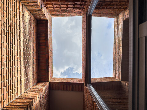 Dramatic Worm's Eye View of Architectural Detail of Textured Brickwork in Modern Urban Design 